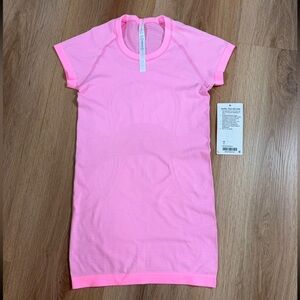 Lululemon Miami Pink Swiftly tech hip length t-shirt.
